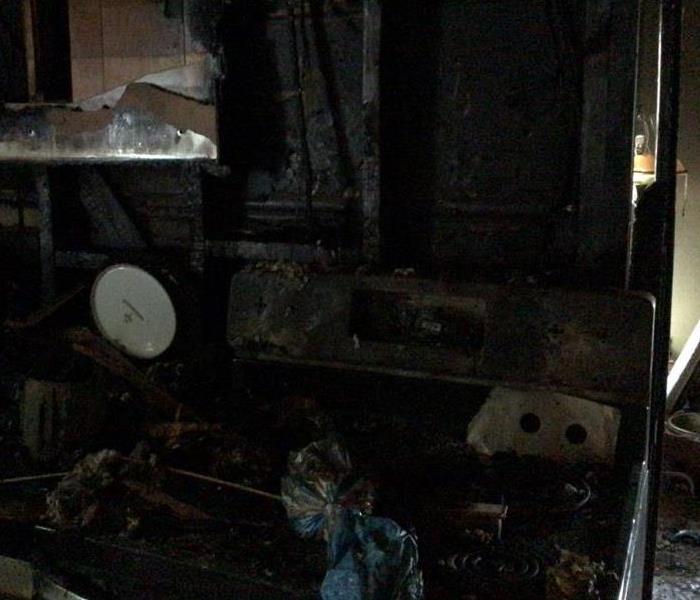 burned kitchen caused by kitchen stove 
