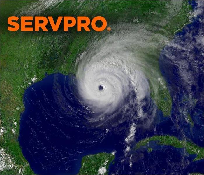 picture of a hurricane over the gulf and the southeast states with Servpro logo
